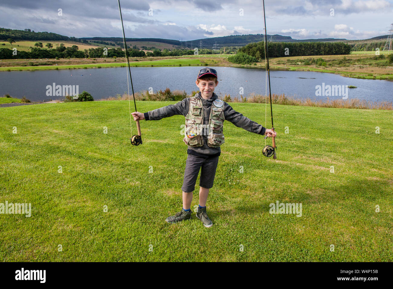 Boy fishing summer hi-res stock photography and images - Page 11 - Alamy