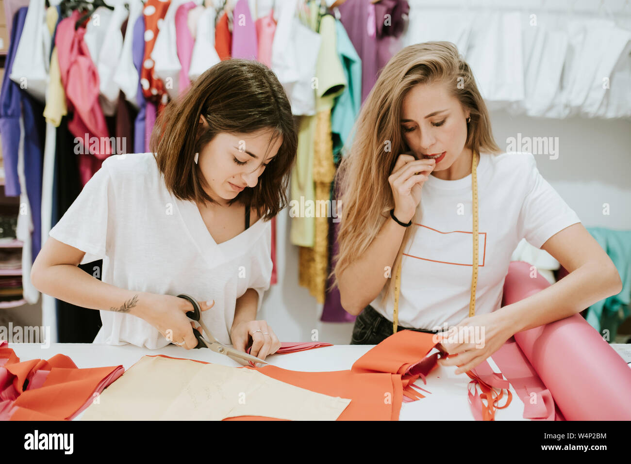 Fashion designers working together in the design studio Stock Photo