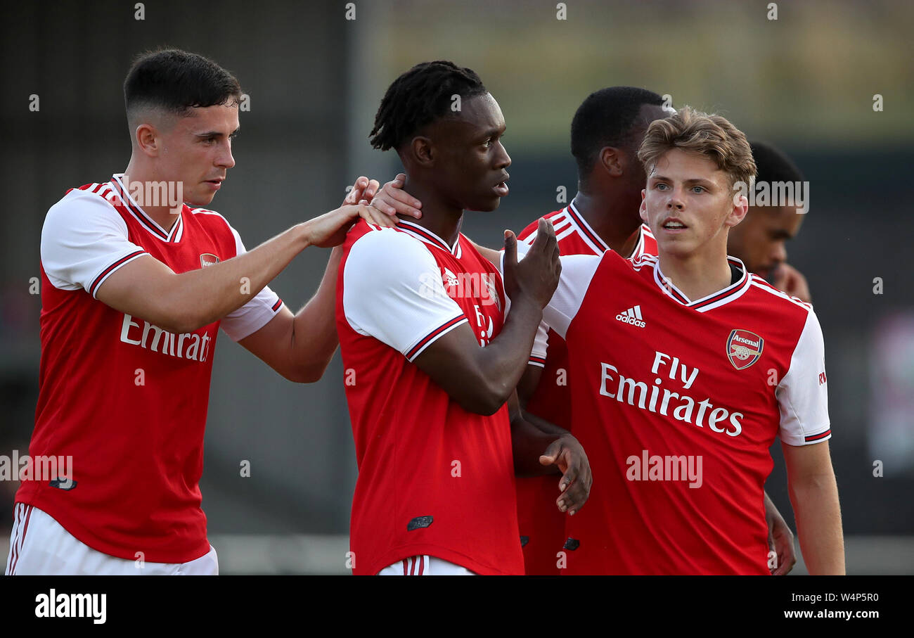 Arsenal's Folarin Balogun (centre) celebrates scoring his side's second goal of the game during the pre-season friendly match at The Hive, London. Stock Photo