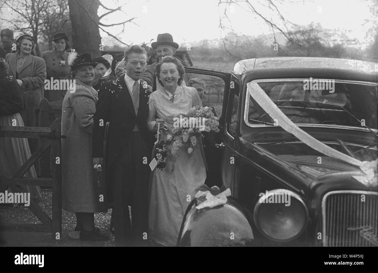1950s Historical Just Married Couple Standing Outside By Their