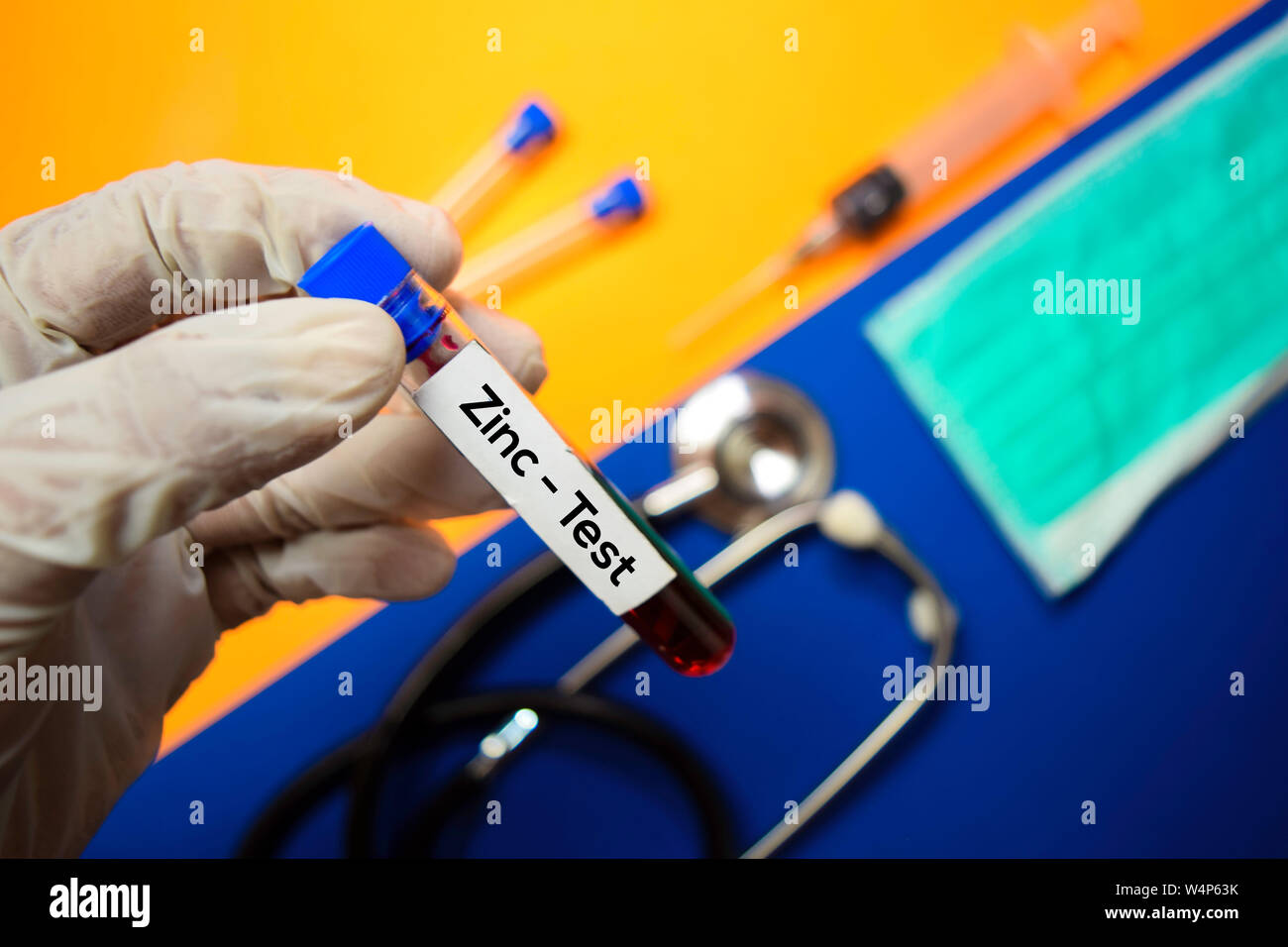 Zinc Test with blood sample. Top view isolated on color background