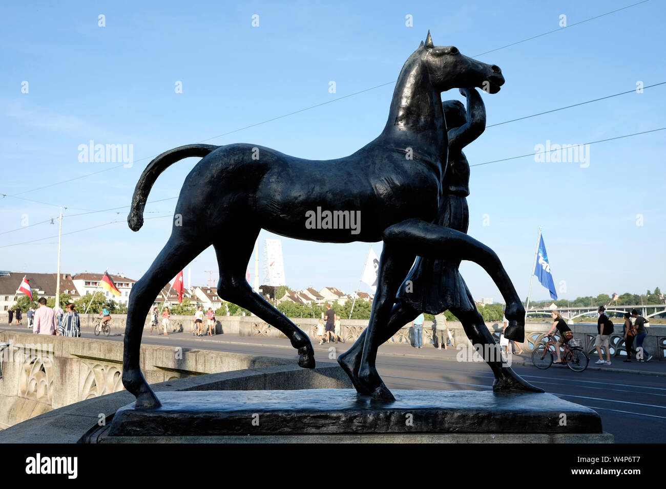 A sculpture of Amazon leading a horse by Carl Nathan Burckhardt, at the  middle bridge, Basel, Switzerland Stock Photo - Alamy