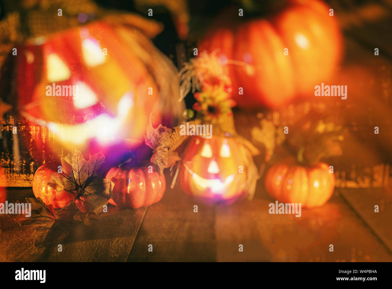 Halloween pumpkin lantern with dry leaves autumn with wooden / head ...