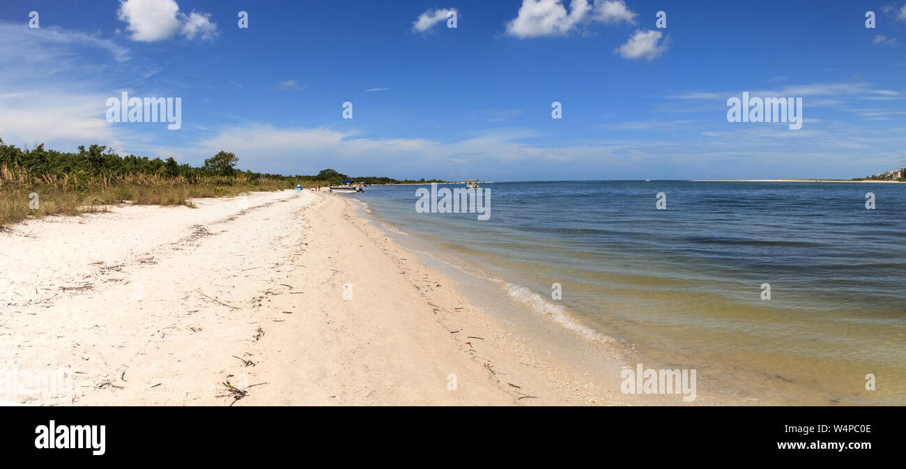 White sand beach path leading to the ocean at Lovers Key State Park Beach in Bonita Springs, Florida. Stock Photo