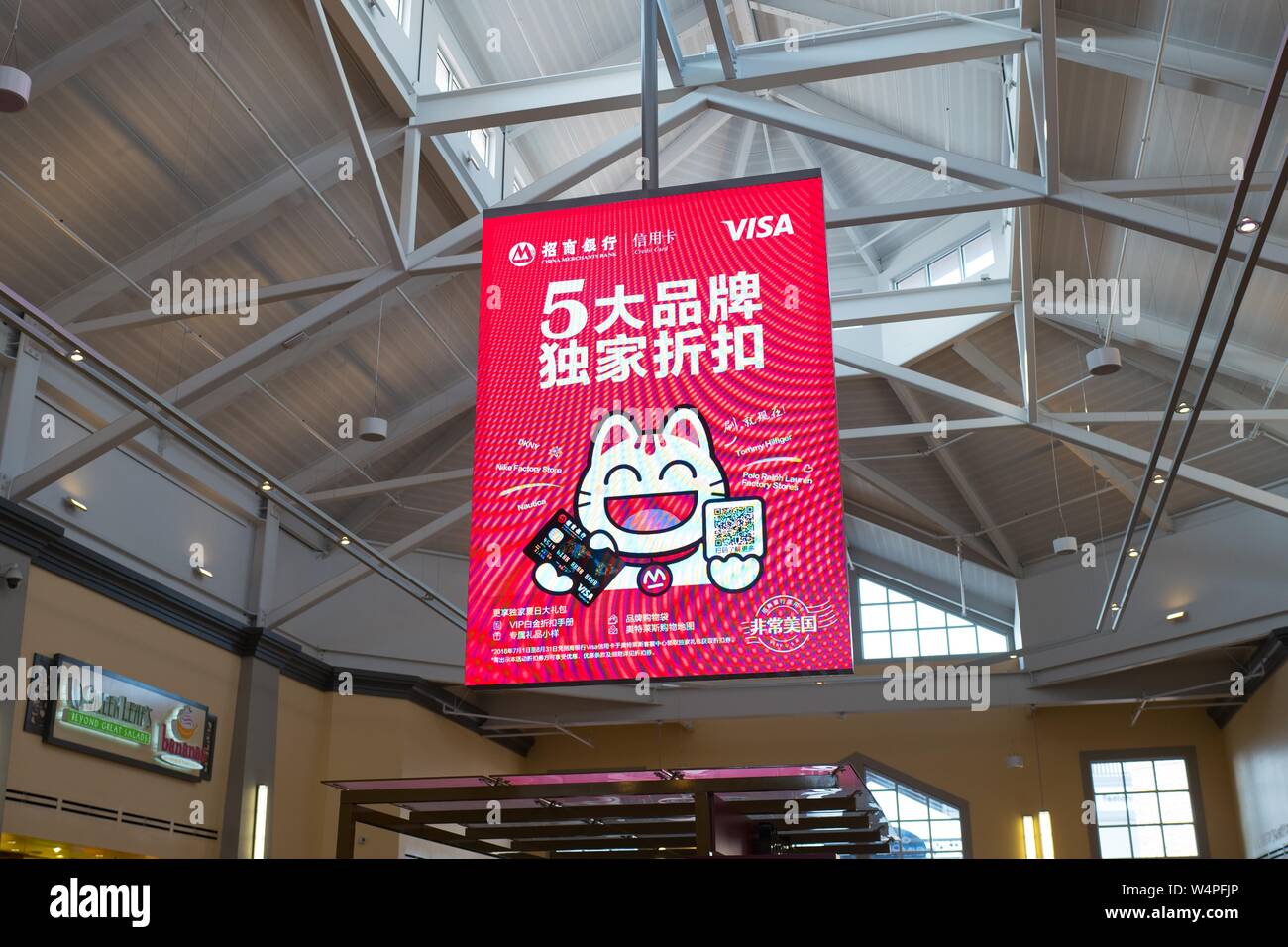 At a Simon Mall shopping mall in Livermore, California, an advertisement for Visa credit cards is displayed in Chinese, August 23, 2018. Many shopping malls in the San Francisco Bay Area cater to the area's large Asian population. () Stock Photo