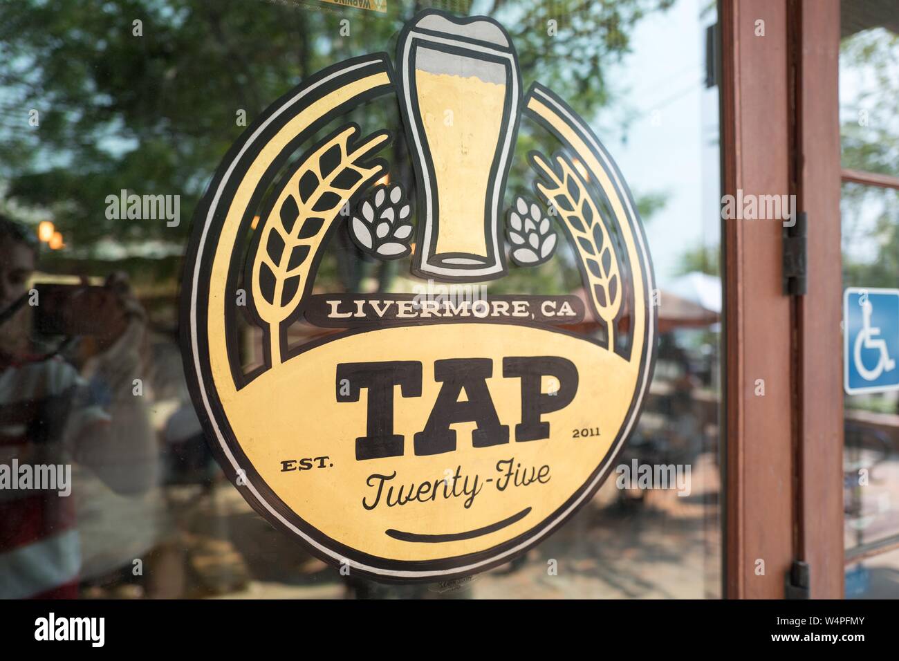 Sign at entrance to Tap 25, a craft beer tap room in downtown Livermore, California, August 25, 2018. () Stock Photo