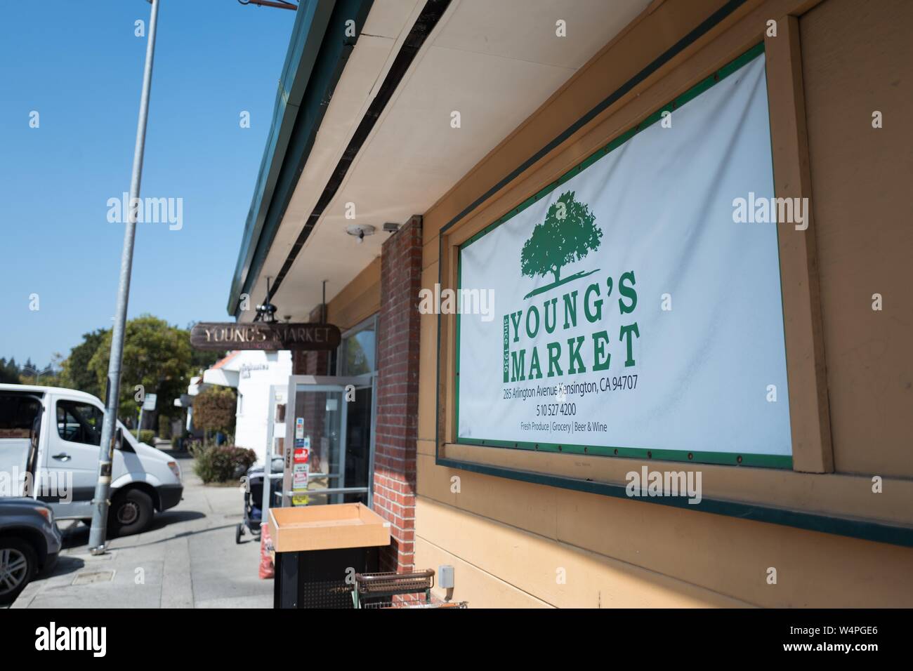 Sign on facade of Young's Market, a local market serving the community since the 1930s, in Kensington, California, a small town in the San Francisco Bay Area, September 4, 2018. () Stock Photo