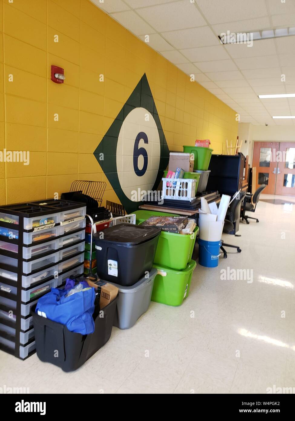 Classroom contents are emptied into hallway for summer cleaning by custodial staff in July, 2019. Stock Photo