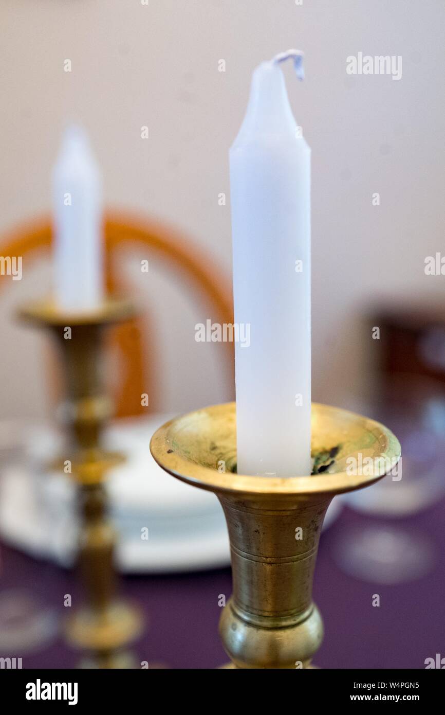 Ceremonial candle holders with candles on the Jewish holiday of Rosh  Hashanah; two ceremonial candles are lit on many Jewish holidays, including Rosh  Hashanah and the weekly Shabbat or sabbath celebration, San