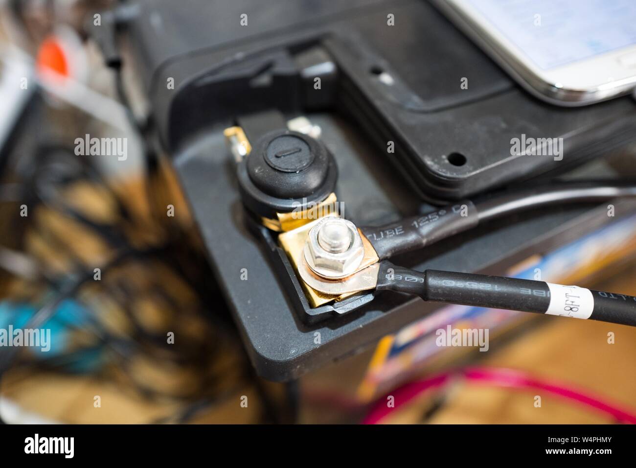 Close-up of screen terminal with wires on the negative terminal of a 12 volt solar photovoltaic battery bank, part of a smart home off grid solar power system, San Ramon, California, September 20, 2018. () Stock Photo