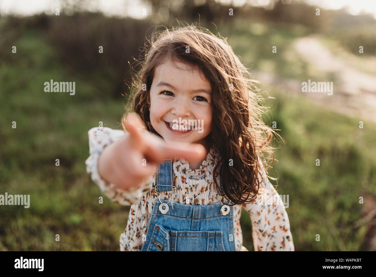 Close up portrait of young school-aged girl smiling with dimples Stock Photo