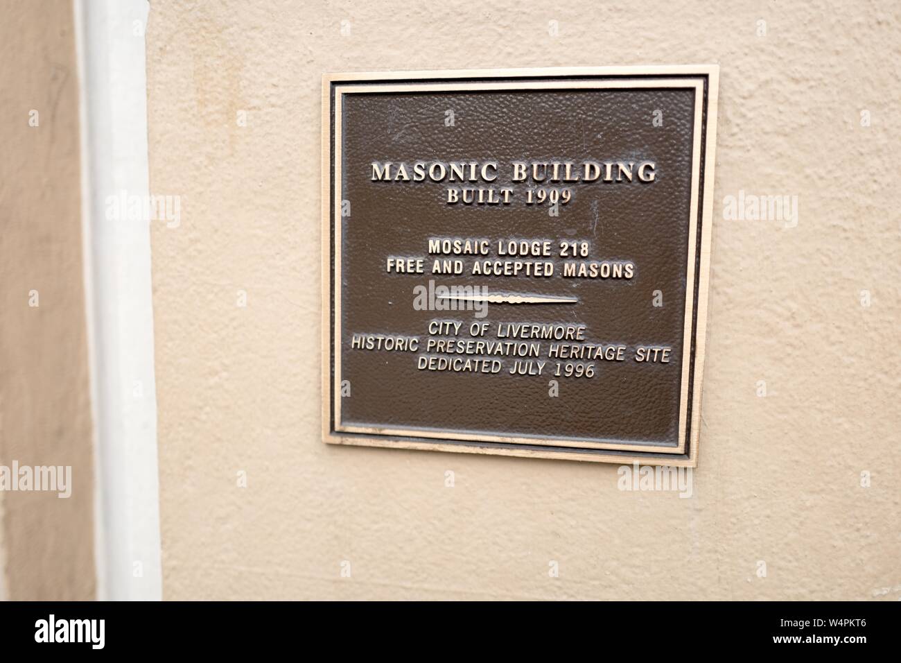 Historical marker for the Masonic Lodge 218, originally built in 1909, on First Street in downtown Livermore, California, October 3, 2018. () Stock Photo