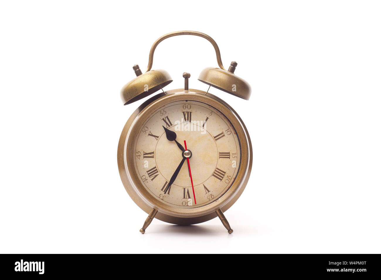 Old alarm clock isolated on white background Stock Photo - Alamy