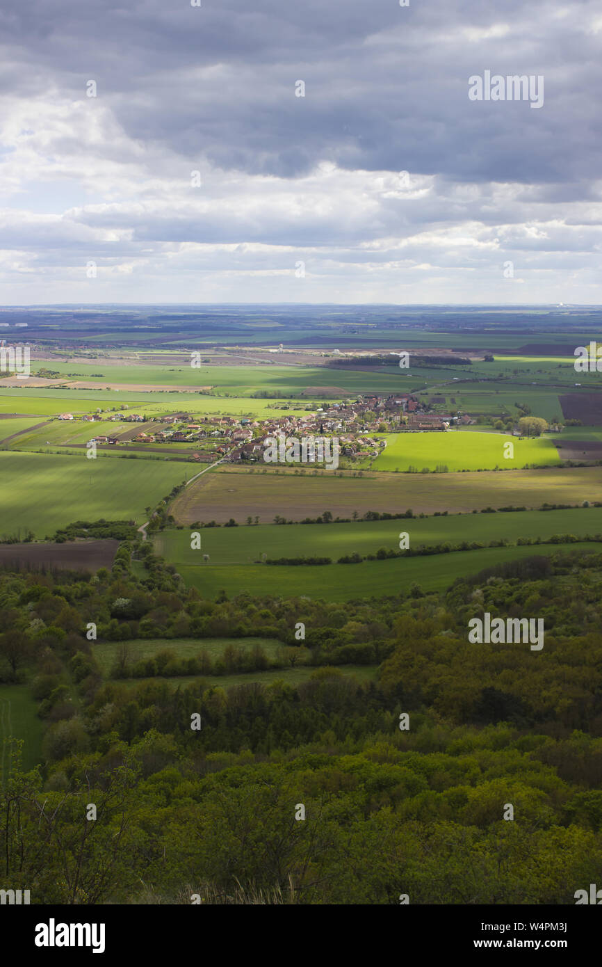 Large landscape with cloudy sky and selective sun shine Stock Photo - Alamy