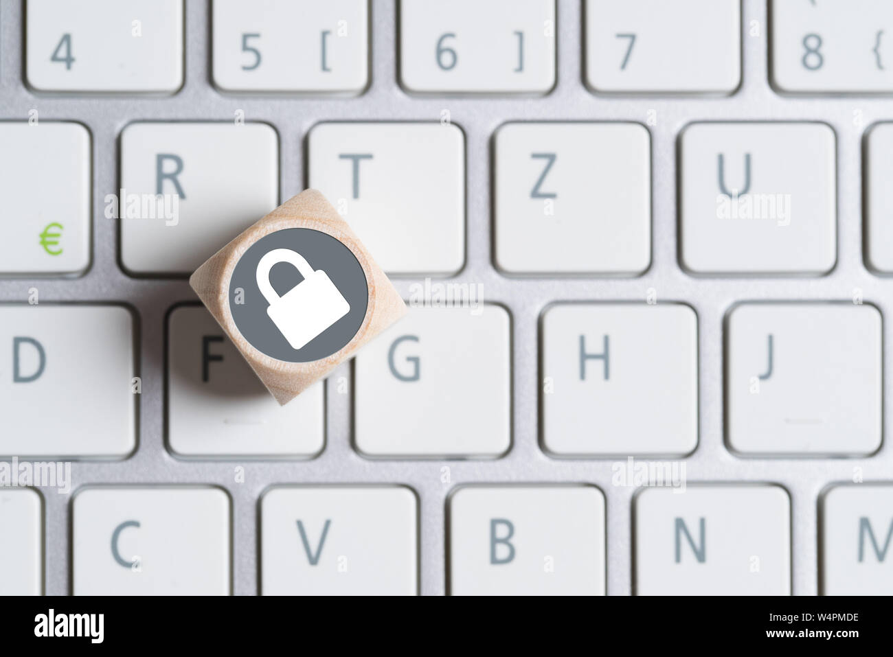 cube with lock symbols on a keyboard Stock Photo