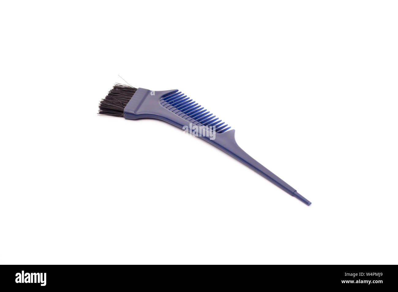 Hairdressers comb with brush Stock Photo Alamy