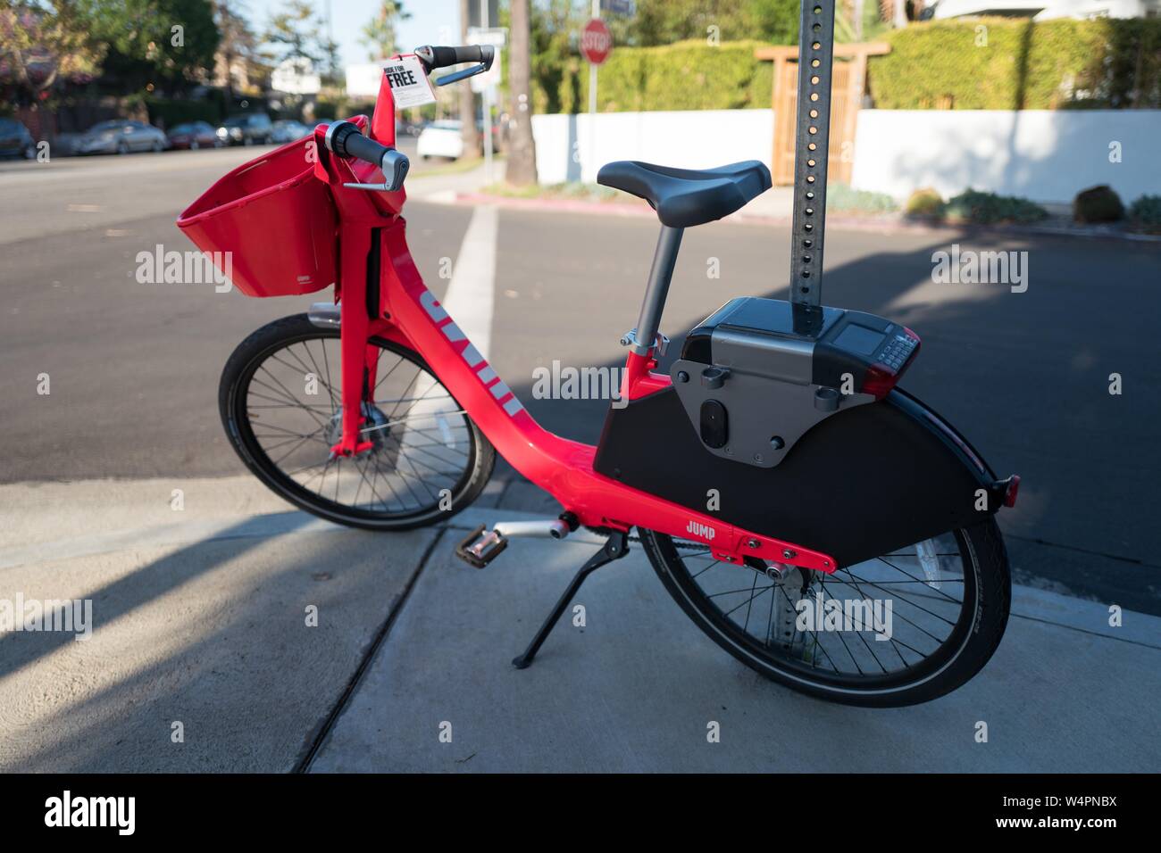 Full length view of dockless electric bicycle from sharing economy company Jump, an affiliate of Uber Inc, parked on a street in the Marina Del Rey neighborhood of Los Angeles, California, October 21, 2018. () Stock Photo