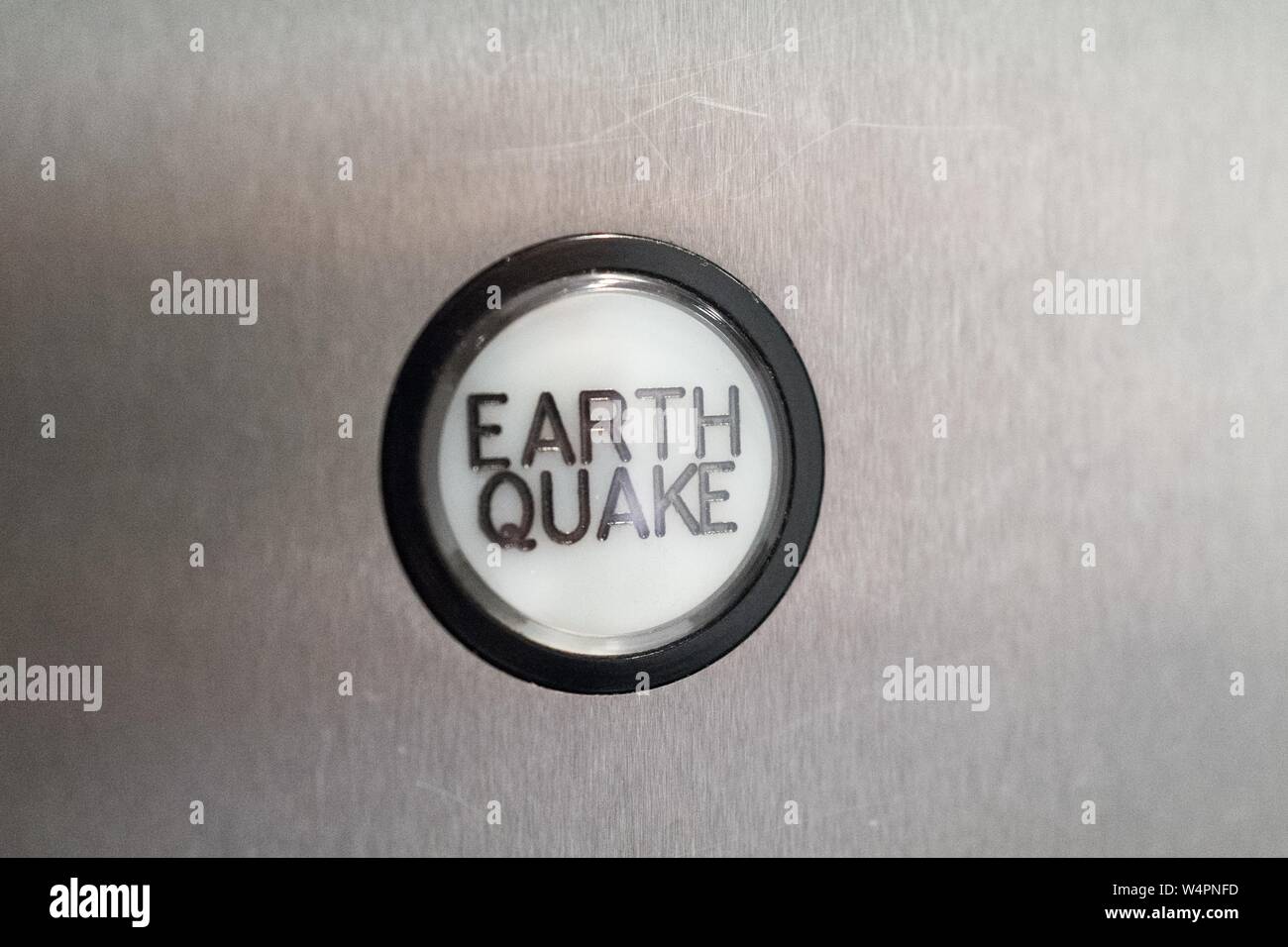 Close-up of earthquake warning button in interior of elevator in downtown Los Angeles, California, used to warn passengers in the event of an earthquake elevator shutdown, October 24, 2018. () Stock Photo