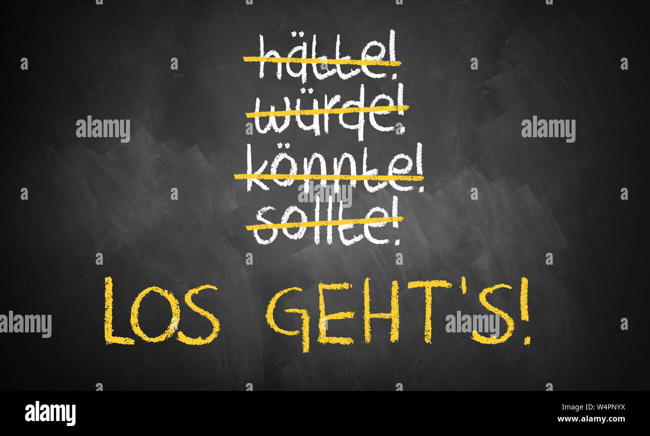 chalkboard with stroked words like could and should and "Let's go" in