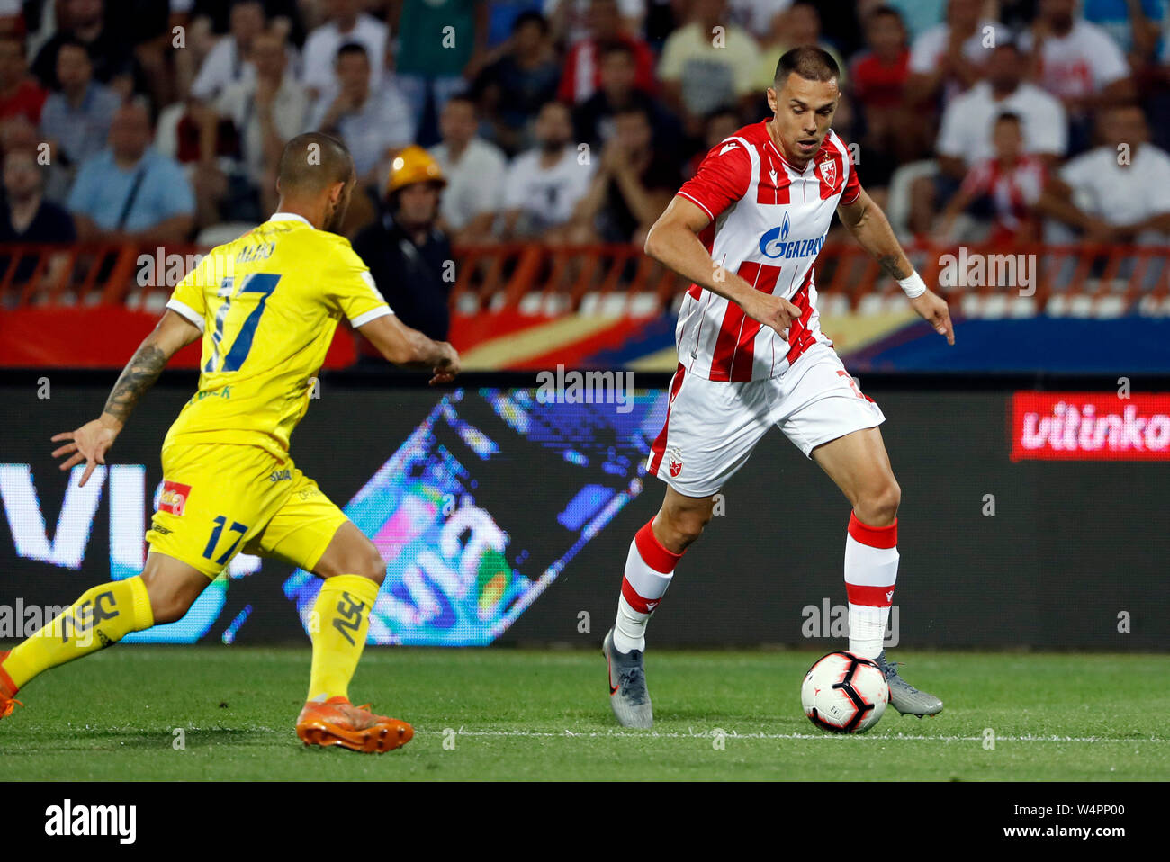 Belgrade. 24th July, 2019. Crvena Zvezda's Milan Rodic (R) vies with HJK's  Nikolai Alho (L) during UEFA Champions League first leg of the second  qualifying round between Serbia's Crvena Zvezda and Finland's