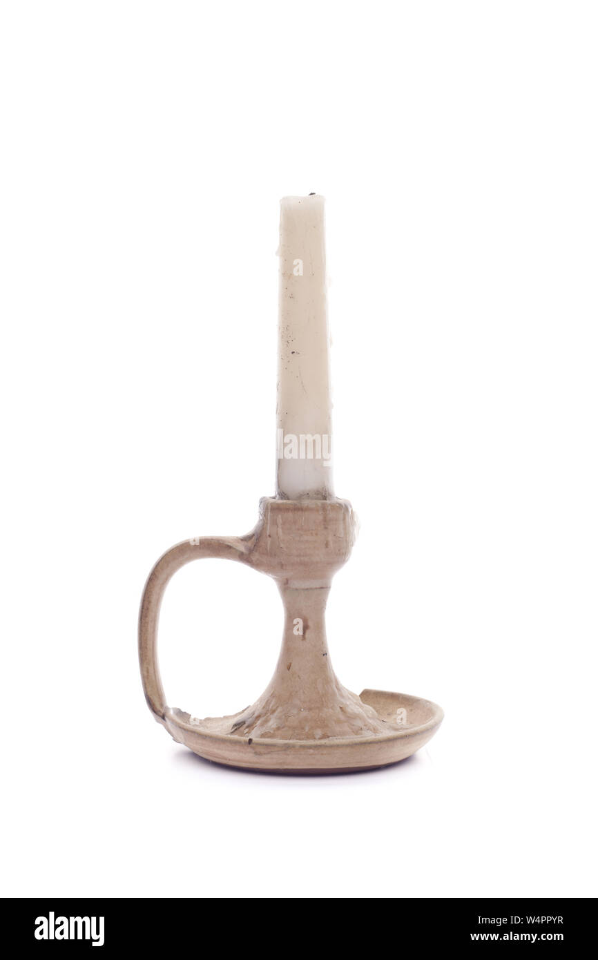 Candle on ceramic holder isolated on white Stock Photo