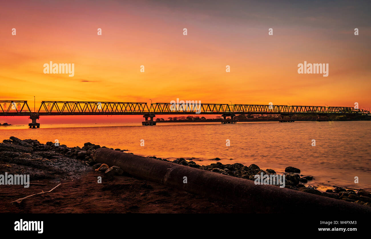sunset at borombong bridge tanjung bayang makassar indonesia Stock Photo