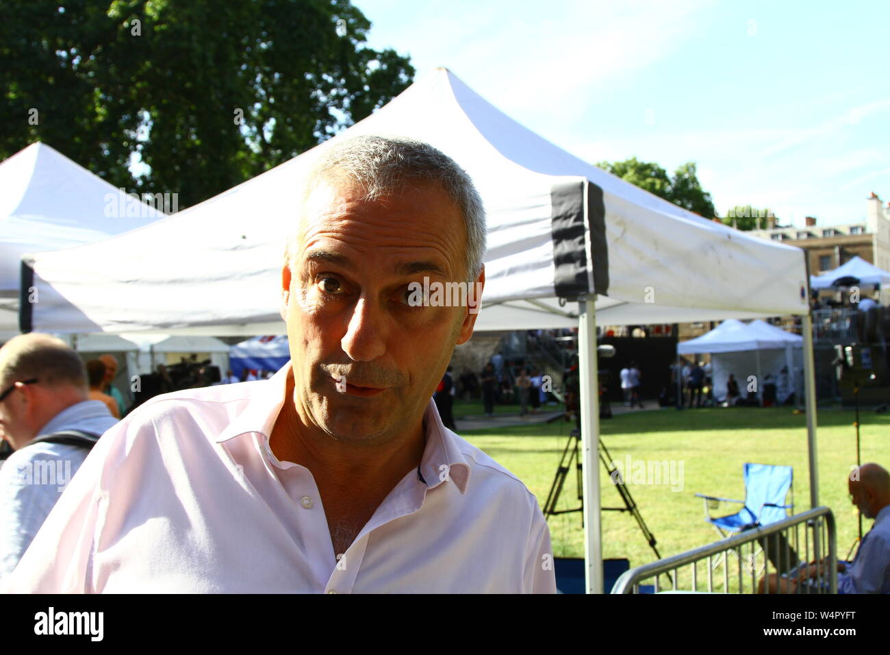 KEVIN MAGUIRE BROADCASTER AND ASSOCIATE EDITOR AT THE DAILY MIRROR NEWSPAPER PICTURED AT COLLEGE GREEN, IN THE CITY OF WESTMINSTER, LONDON,UK ON 24TH JULY 2019. Stock Photo