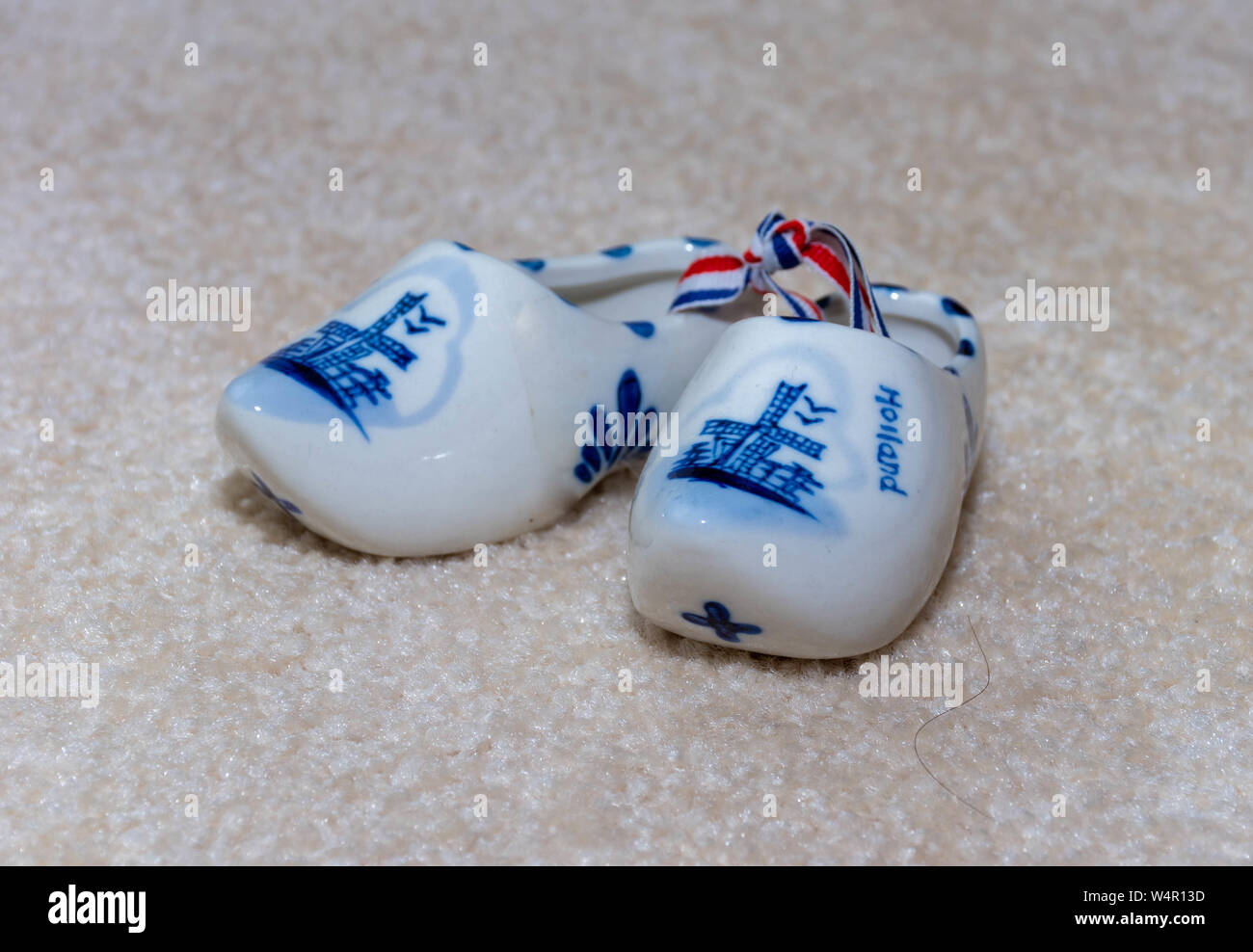 Delft Blue Figurine of dutch wooden shoes porcelain. Souvenir from