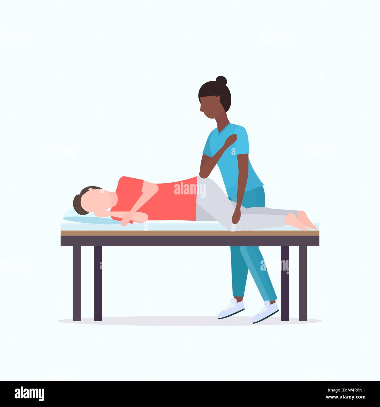 guy lying on massage bed african american masseuse therapist doing