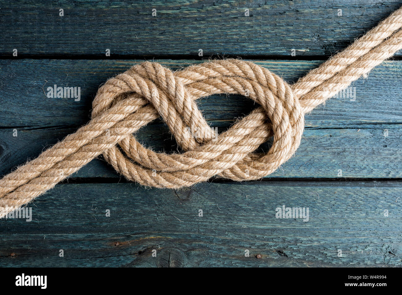Double Figure Eight knot. Rope node Stock Photo - Alamy