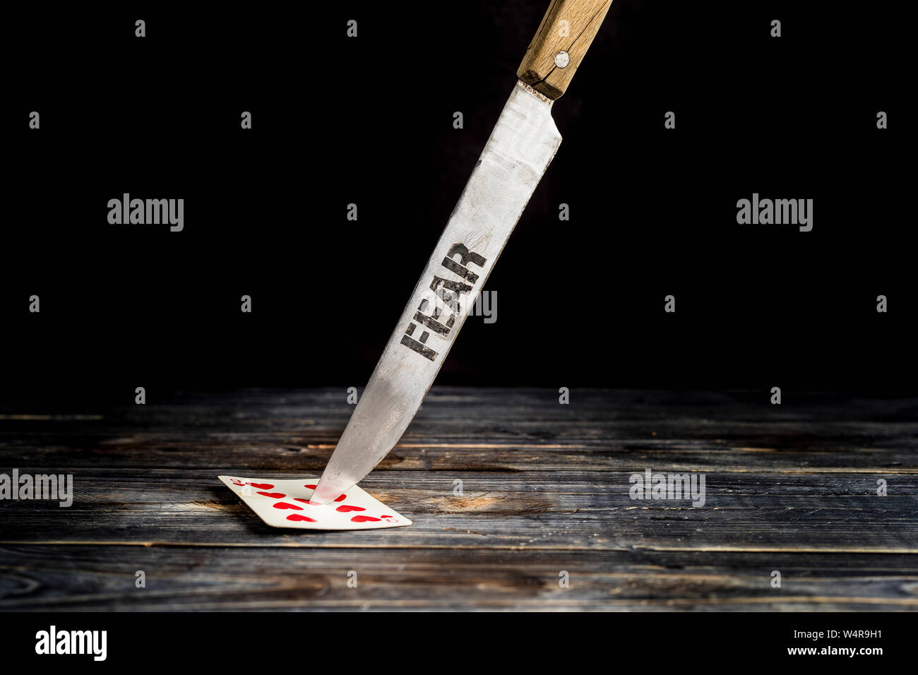Knife with title FEAR Stock Photo - Alamy