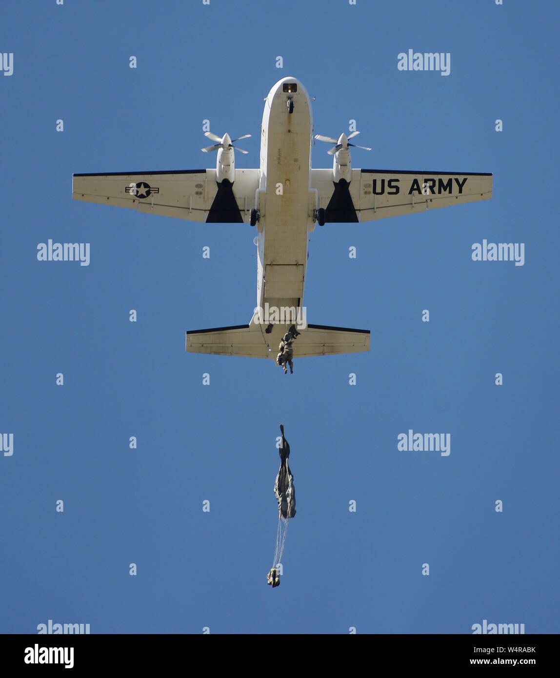 Soldiers from the U.S. Army John F. Kennedy Special Warfare Center and School and 3rd Special Forces Group (Airborne) jump from a CASA C-212 Aviocar over Laurinburg-Maxton Airfield March 28, 2019. The Soldiers completed an all-female pass to pay homage to the rich history of women in the U.S. Army. (U.S. Army photo by K. Kassens) Stock Photo