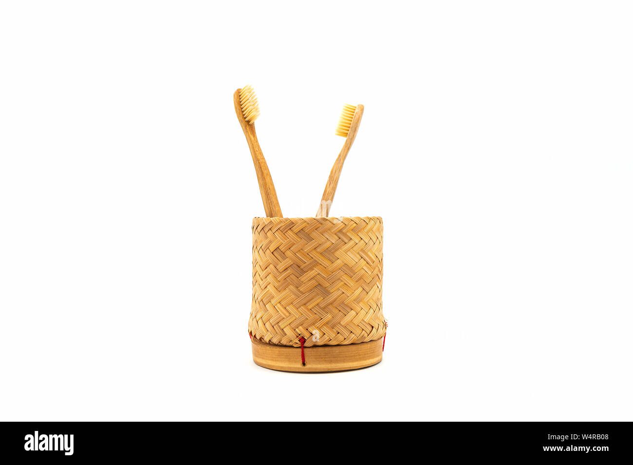 Close up bamboo toothbrush on white background Stock Photo - Alamy