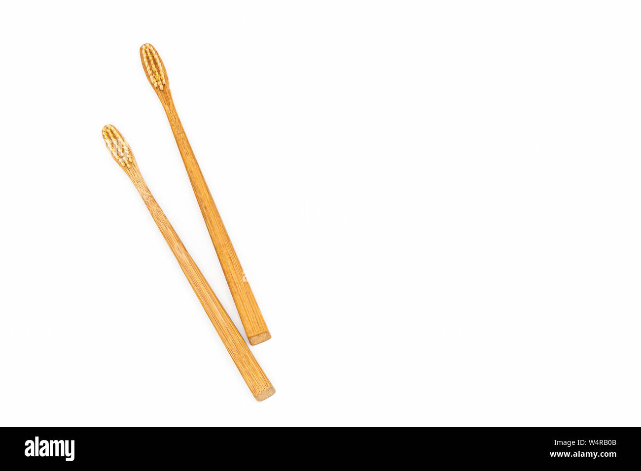 Close up bamboo toothbrush on white background Stock Photo - Alamy