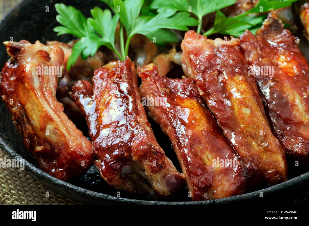 Delicious fried pork ribs close up view Stock Photo Alamy