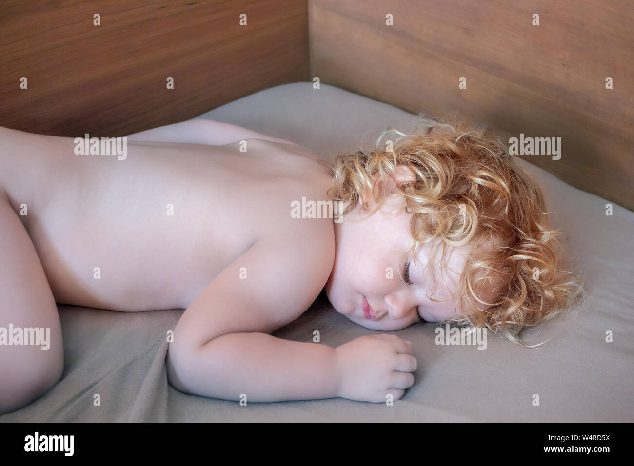Portrait of sleeping baby girl, concept of family life. Stock Photo