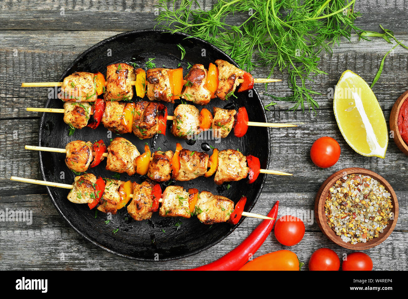 Appetizer chicken kebab with vegetables, top view Stock Photo