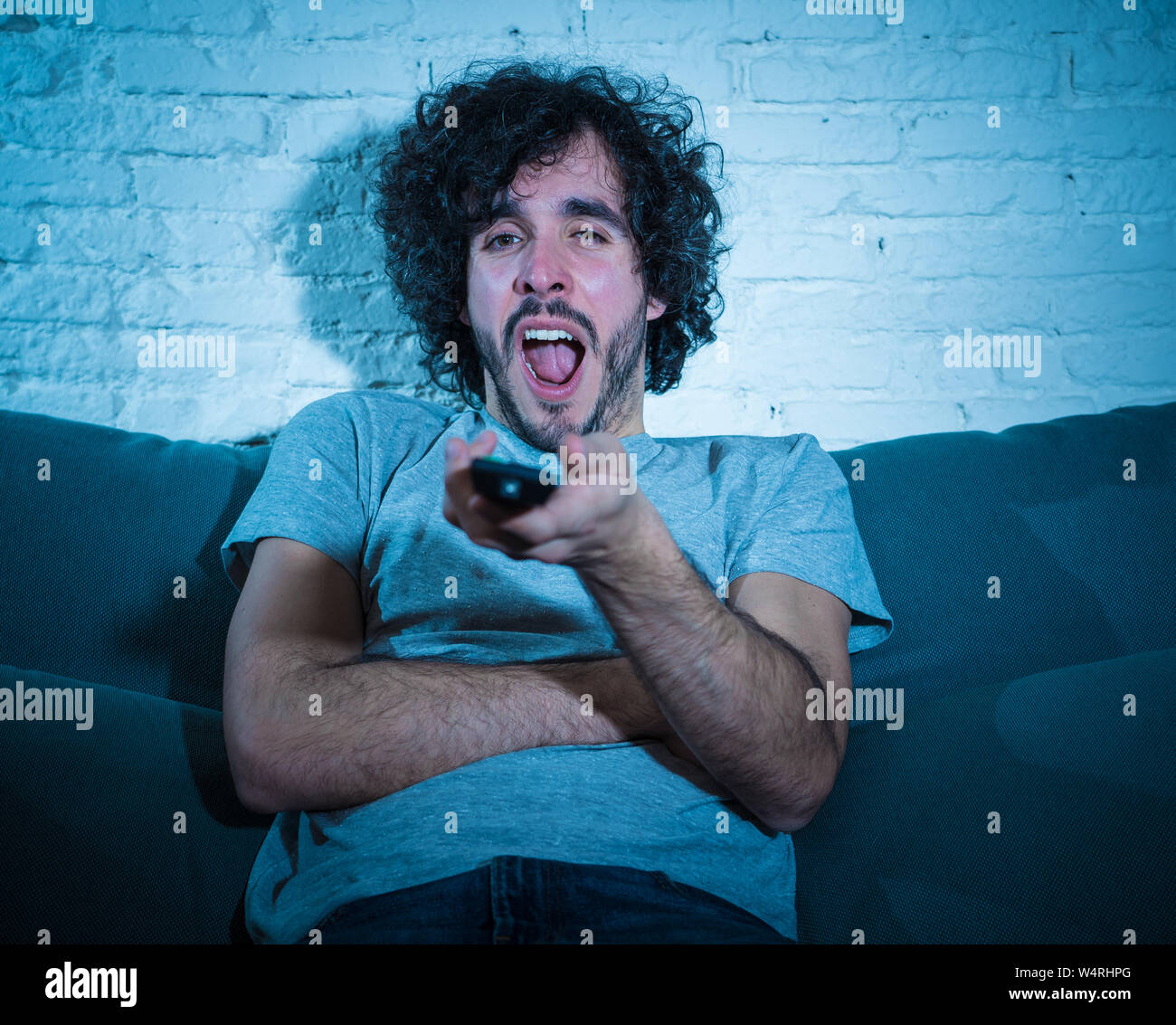 Falling asleep watching tv hires stock photography and images Alamy