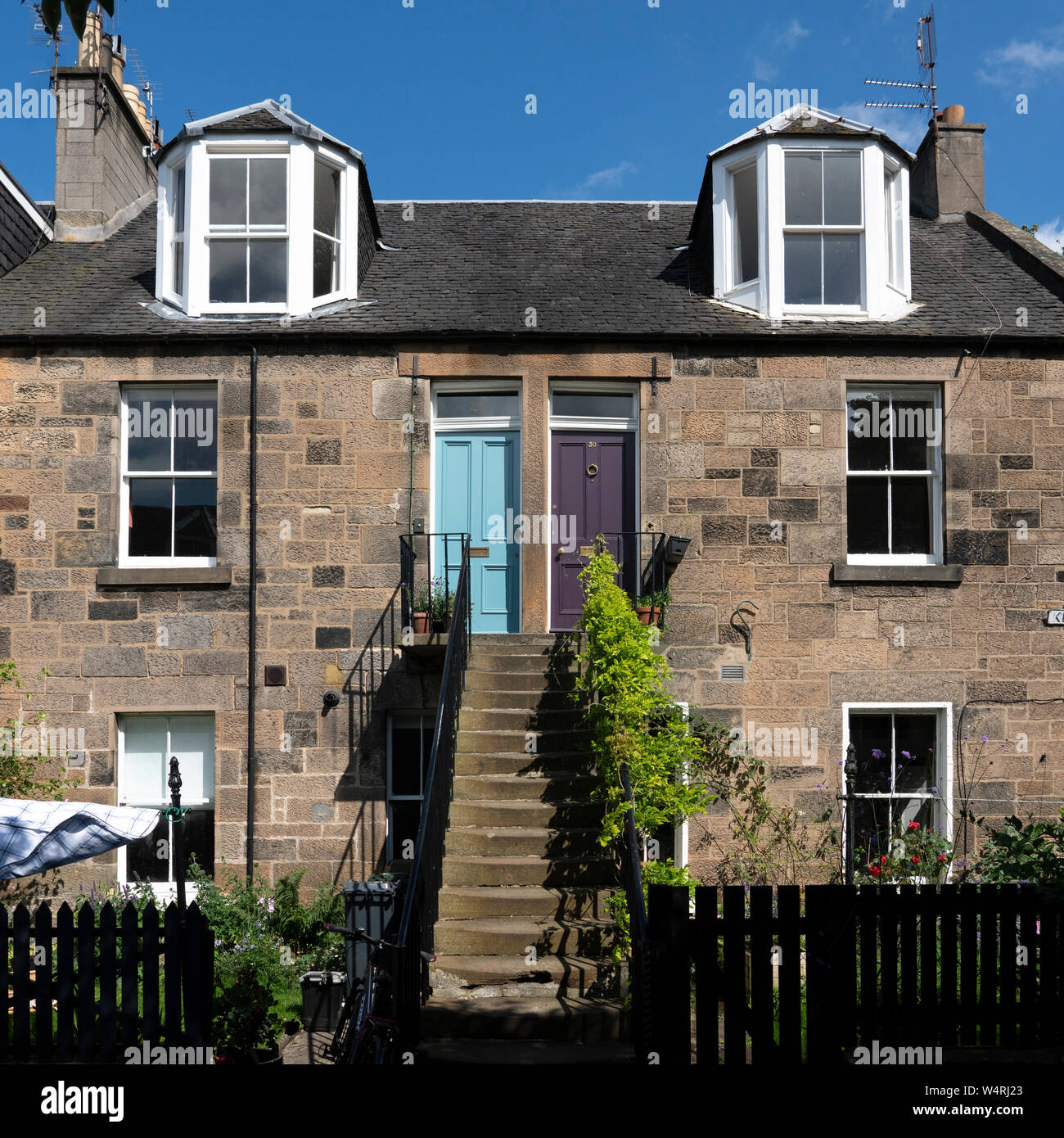 Exterior view of row of Colony style terraced houses in Stockbridge, Edinburgh, Scotland, UK Stock Photo