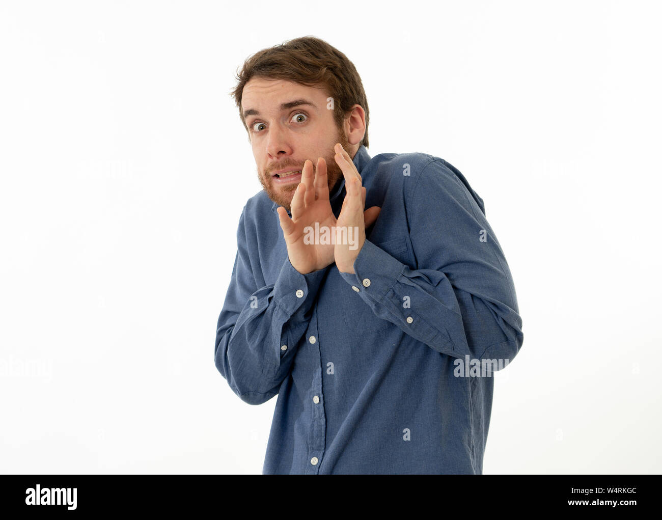 Man scared hands face hi-res stock photography and images - Alamy