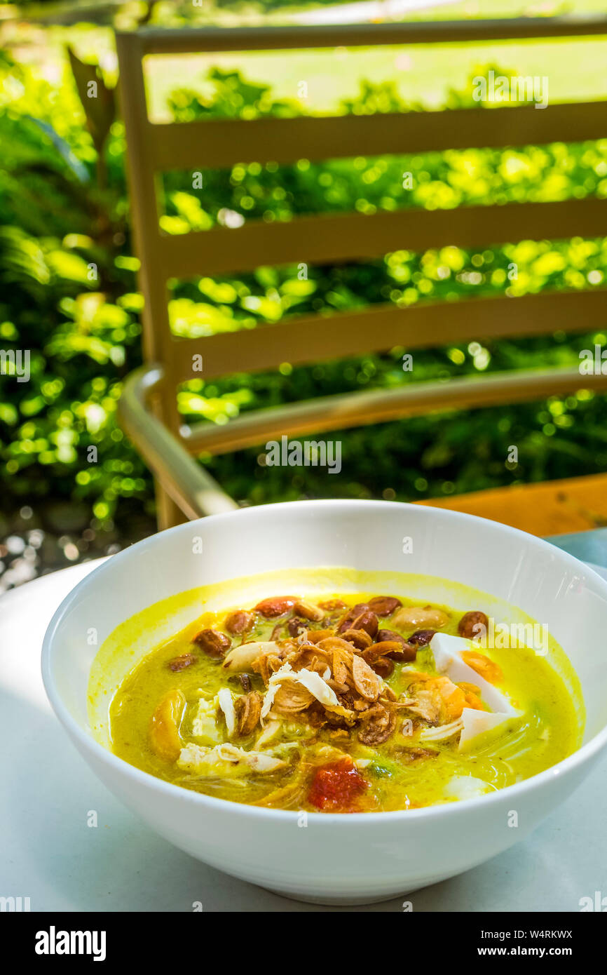 Bowl of chicken congee, Nusa Dua, Bali, Indonesia Stock Photo