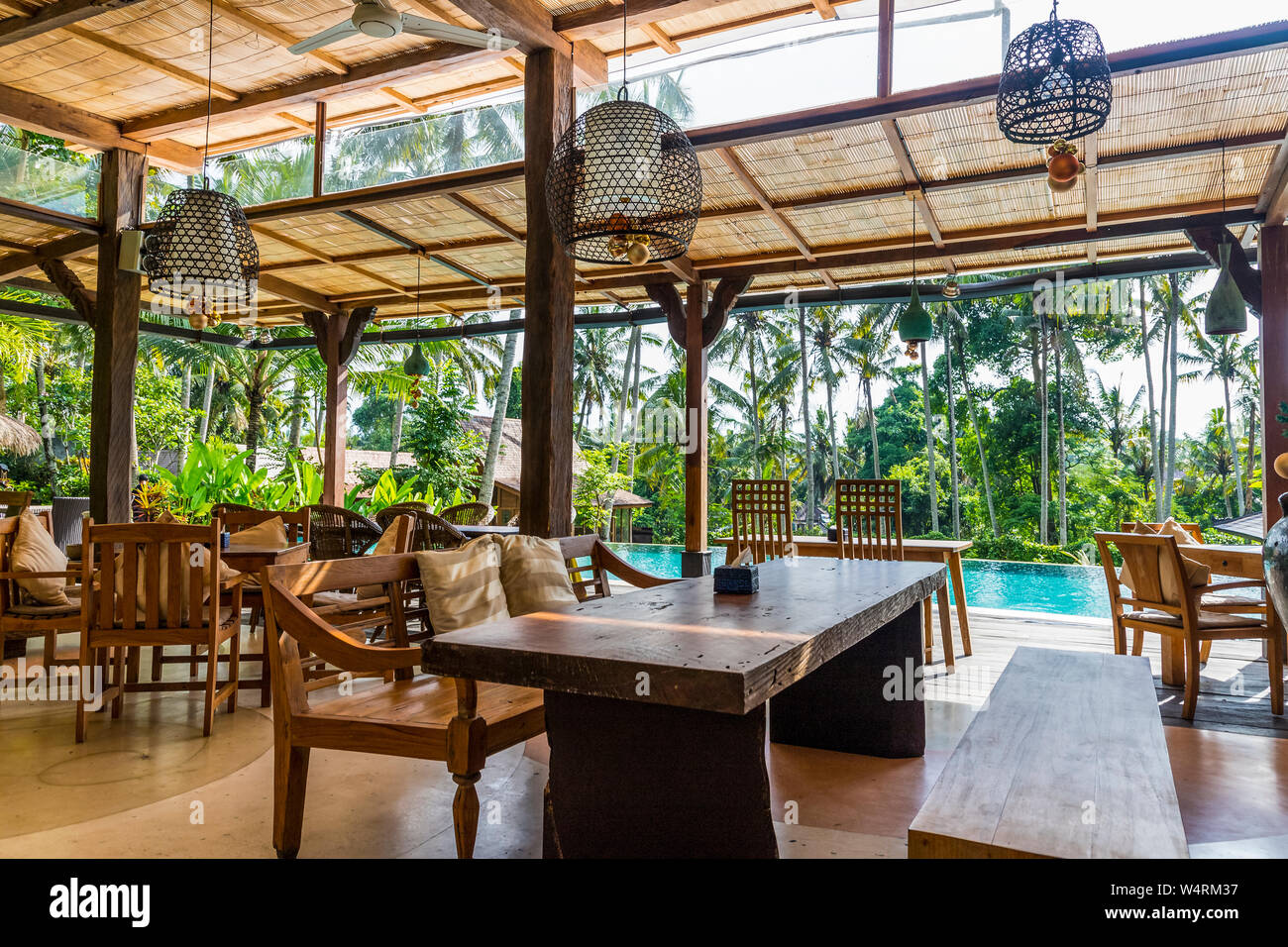 Canopies over chairs and tables, Ubud, Bali, Indonesia Stock Photo