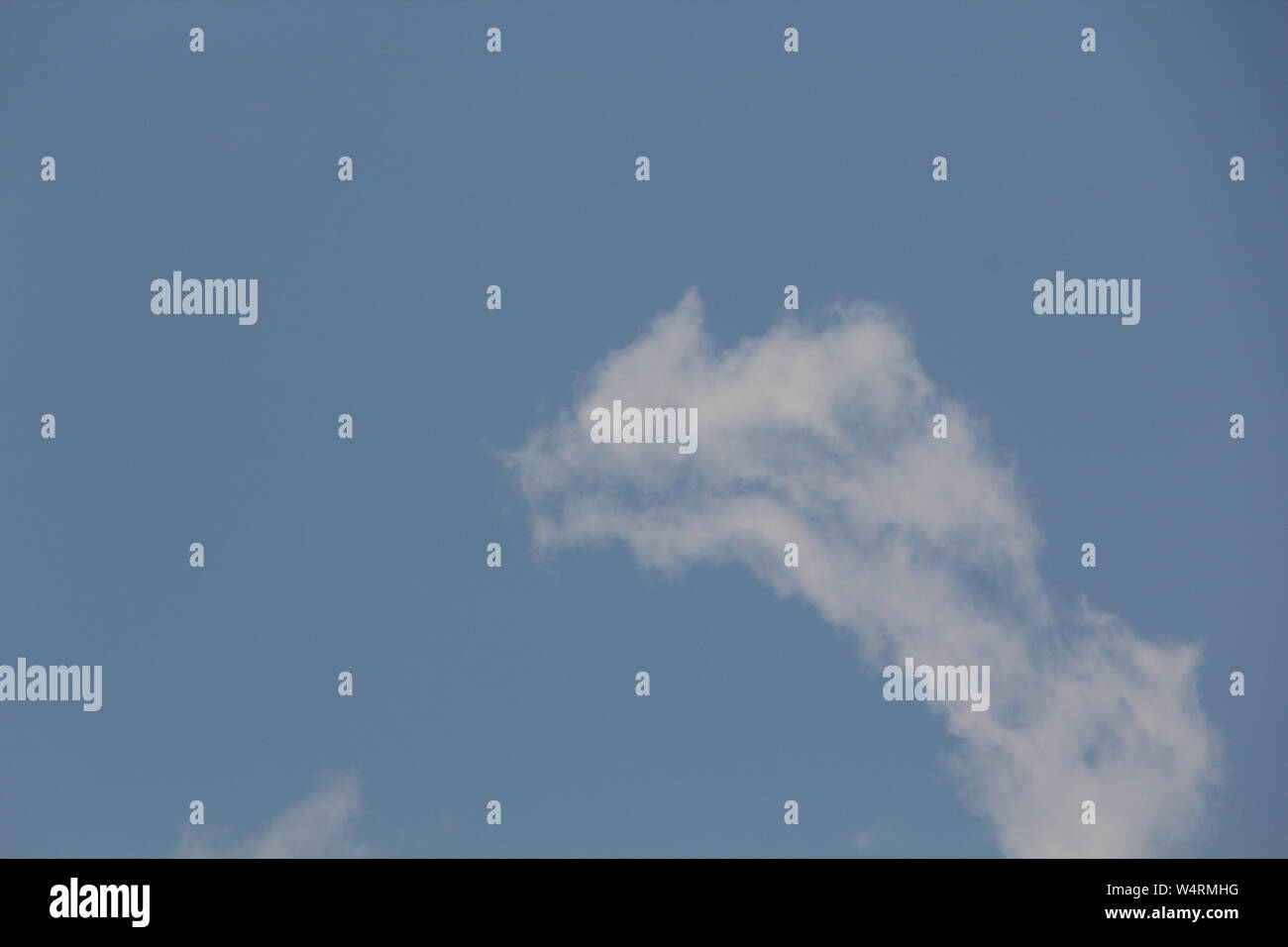 Low angle view of clouds in the sky Stock Photo - Alamy
