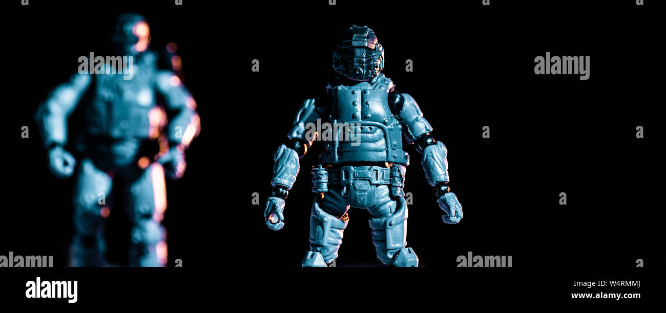 selective focus of toy plastic soldiers isolated on black, panoramic shot Stock Photo