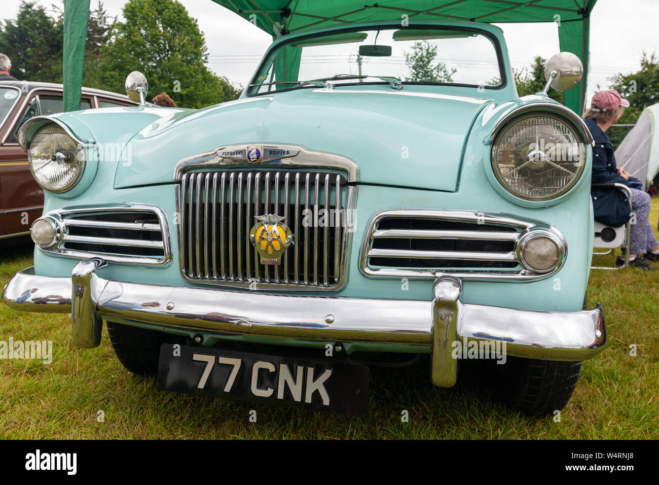 Sunbeam Rapier classic saloon car with an AA badge on the front at a summer fete, England, UK Stock Photo