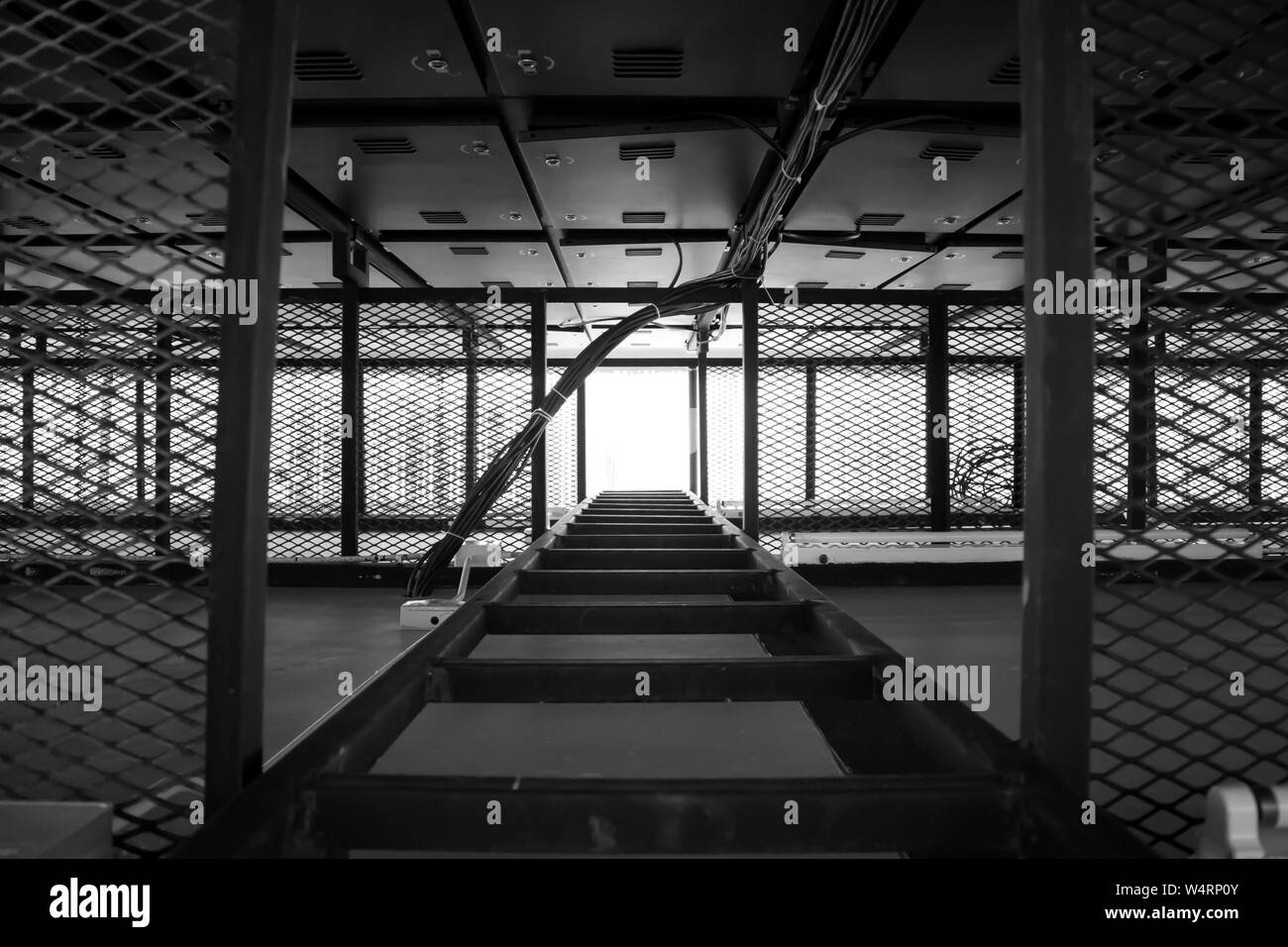 Way up the steel ladder in black Stock Photo Alamy