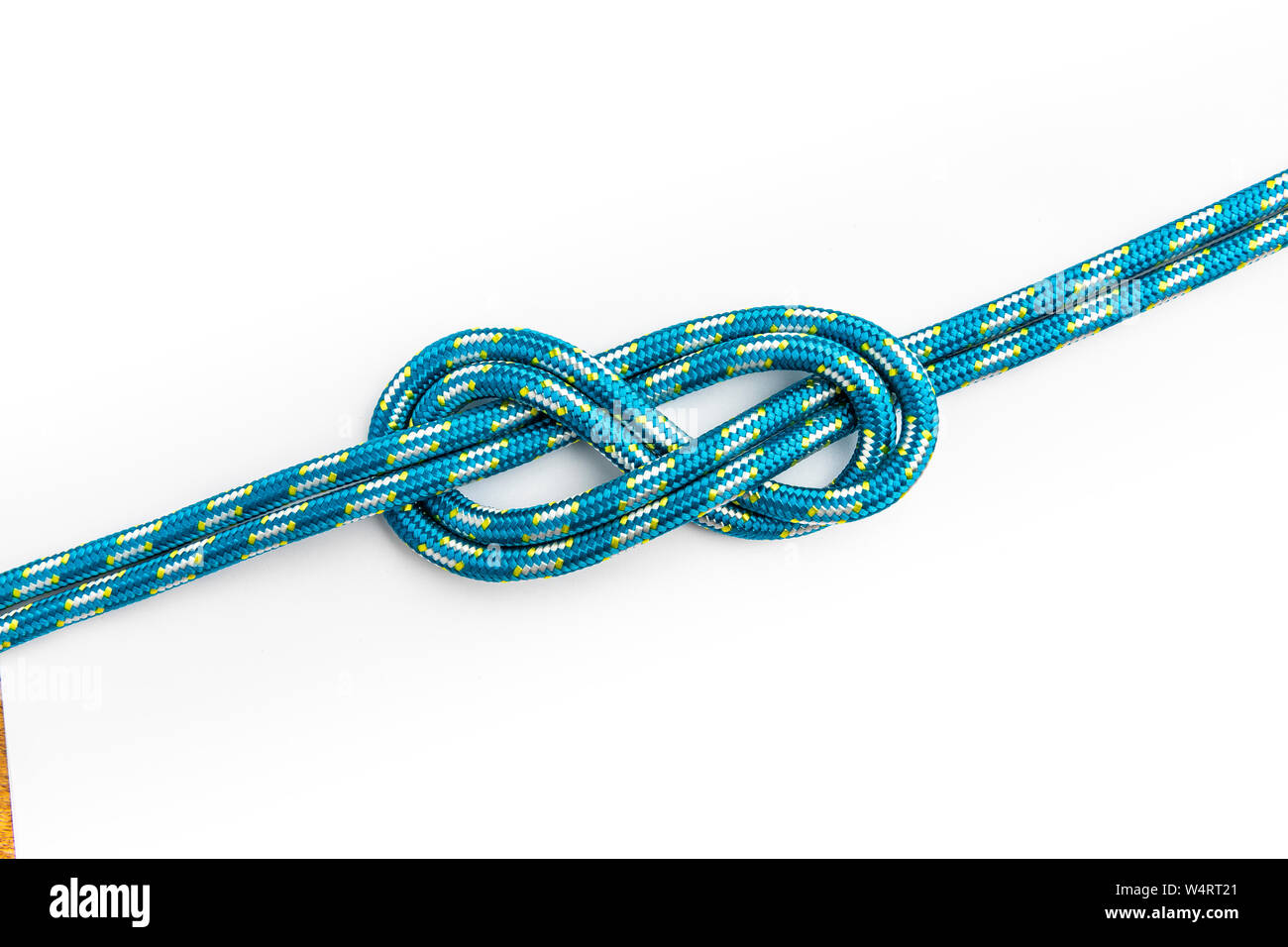 Double Figure Eight knot on white background. Rope node Stock Photo - Alamy