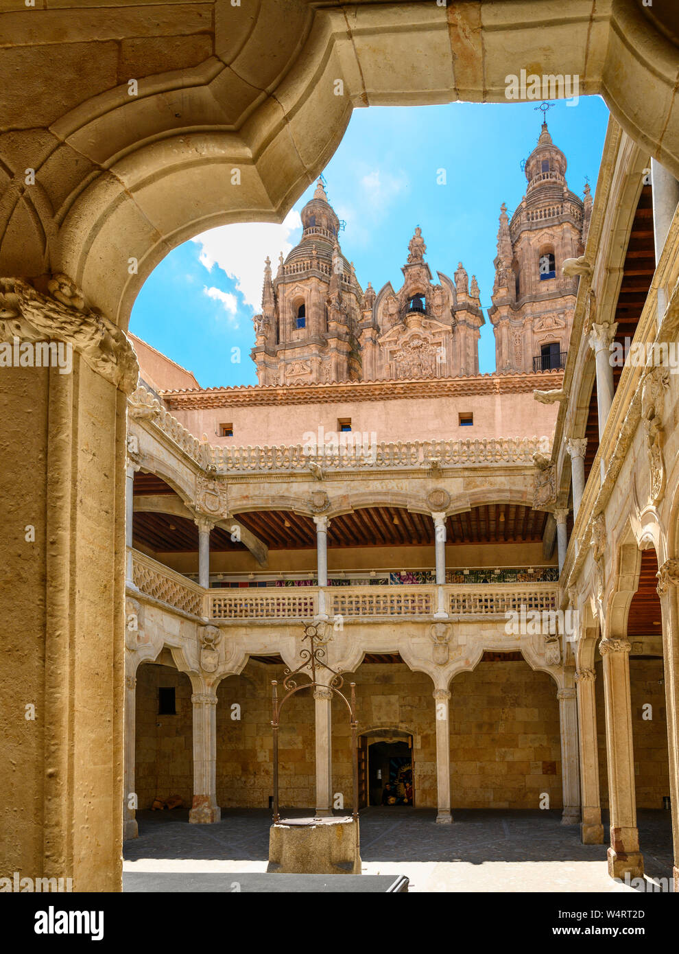 The interior courtyard of the, 16th century, Casa De Las Conchas with the Cathedral in the background, Salamanca, Spain. Stock Photo