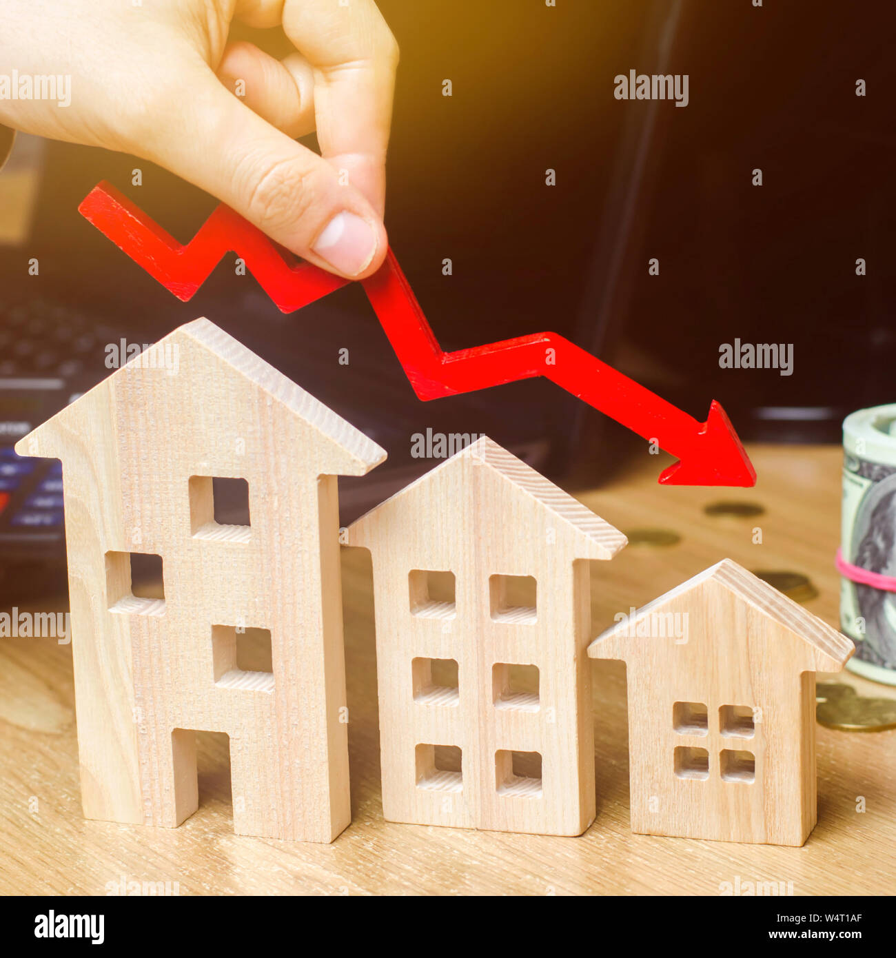 The concept of falling real estate market. Reduced interest in the mortgage. A decline in property prices and apartments. Low interest rates on mortga Stock Photo