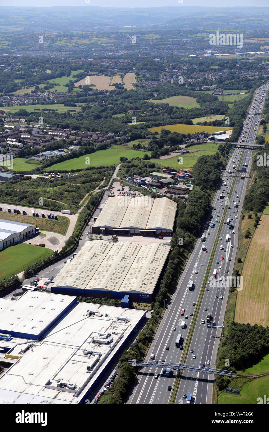 aerial view of the two XL Joinery Limited factories alongside the M62 motorway at Birstall near Leeds, UK Stock Photo